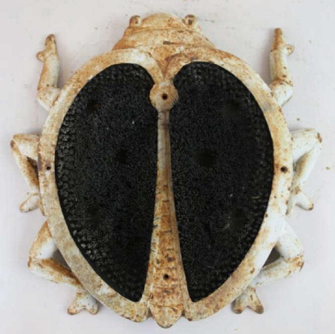VINTAGE DOORWAY CAST IRON SHOE BUG (1 of 4)