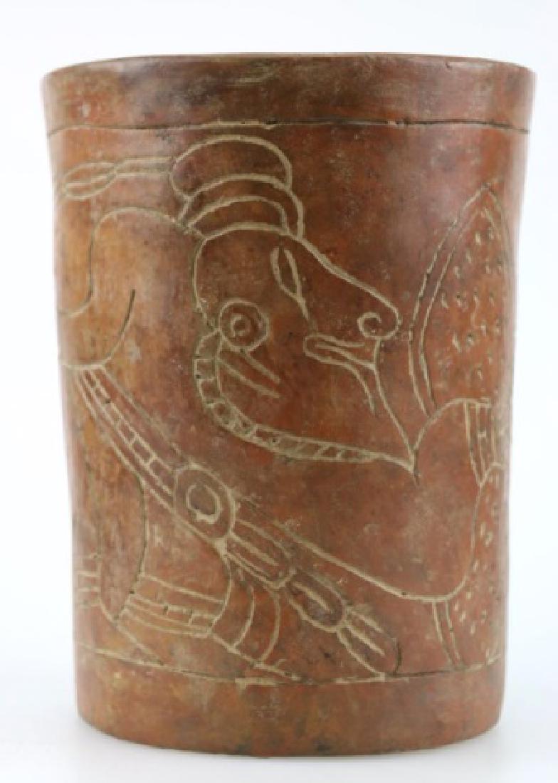 PRE-COLUMBIAN MAYAN CARVED CYLINDER CA 600 AD: CLASSIC MAYAN PRE-COLUMBIAN ART, CA 600 AD, 7 1/4" H, BUFF-TAN TERRACOTTA CYLINDER WITH INCISED SCENE ON EXTERIOR OF HUMAN FIGURES SEATED, HOLDING LARGE CACTUS BODIES IN FRONT, REASSEMBLED FROM NUMERO