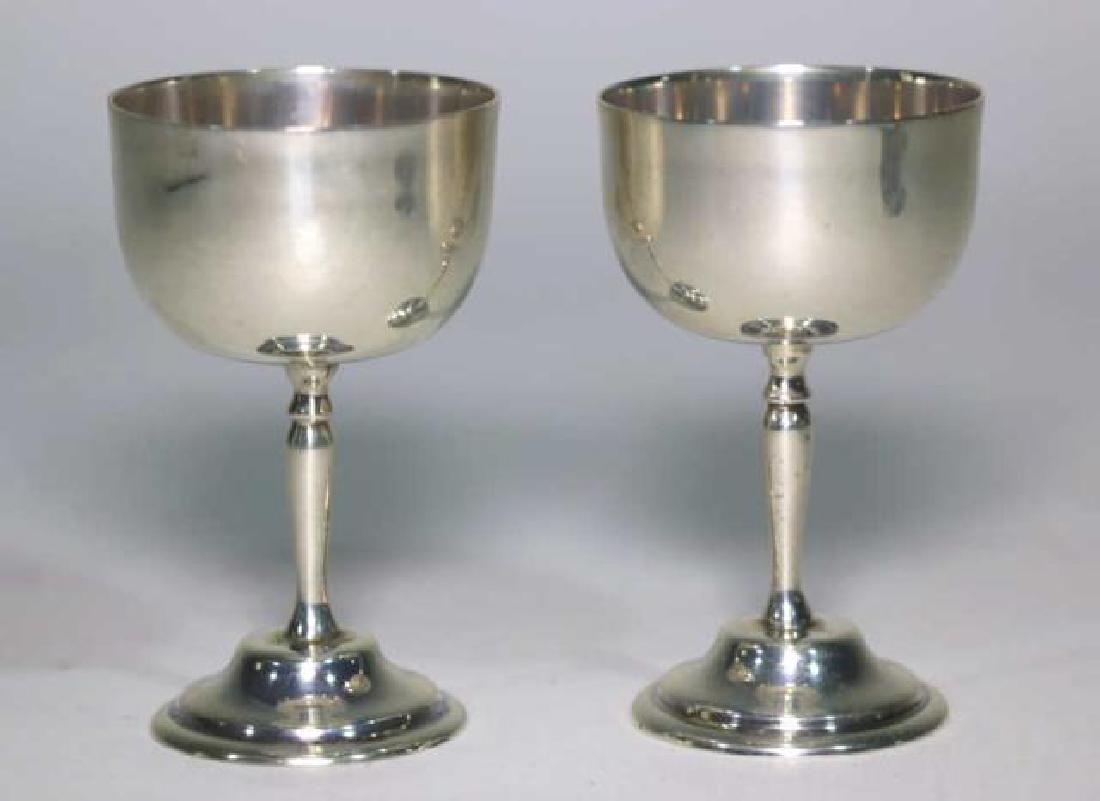 STERLING SILVER RAISED MASTER SALTS: PAIR OF STERLING SILVER RAISED MASTER SALTS, MARKED 925 STERLING 3" X 2"