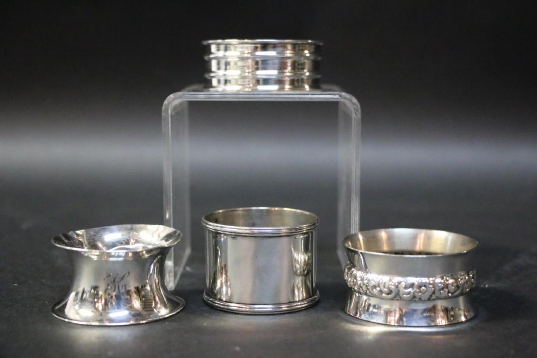 STERLING SILVER NAPKIN RING GROUPING: STERLING SILVER NAPKIN RING GROUPING
