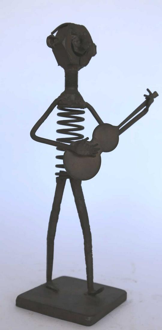 JAMES HAMERICK (NC) INDSUTRIAL METAL SCULPTURE: JAMES HAMERICK (NC) INDSUTRIAL METAL SCULPTURE OF A BANJO PLAYER