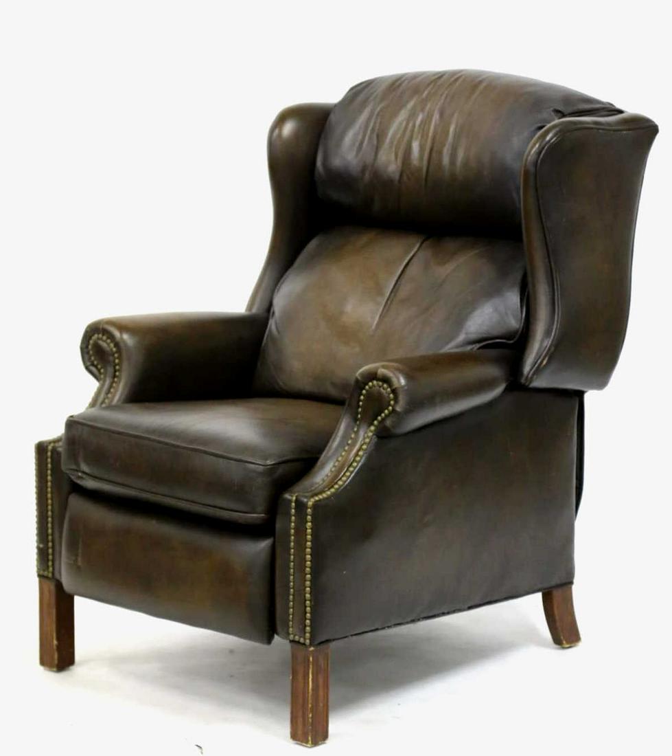 BRADINGTON-YOUNG CUSTOM LEATHER WINGED RECLINER: BRADINGTON-YOUNG CUSTOM NAIL TRIMMED LEATHER WINGED BACK RECLINER