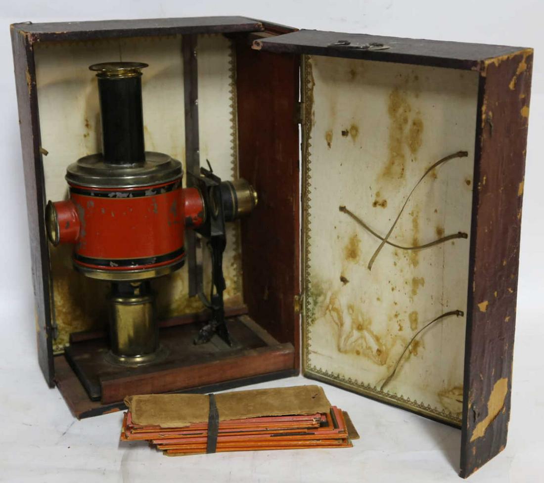 ANTIQUE MAGIC LANTERN PROJECTOR IN BOX W/ SLIDES: LOT INCLUDES EVERYTHING IN PHOTOGRAPH, VIEWER, SLIDES, AND BOX