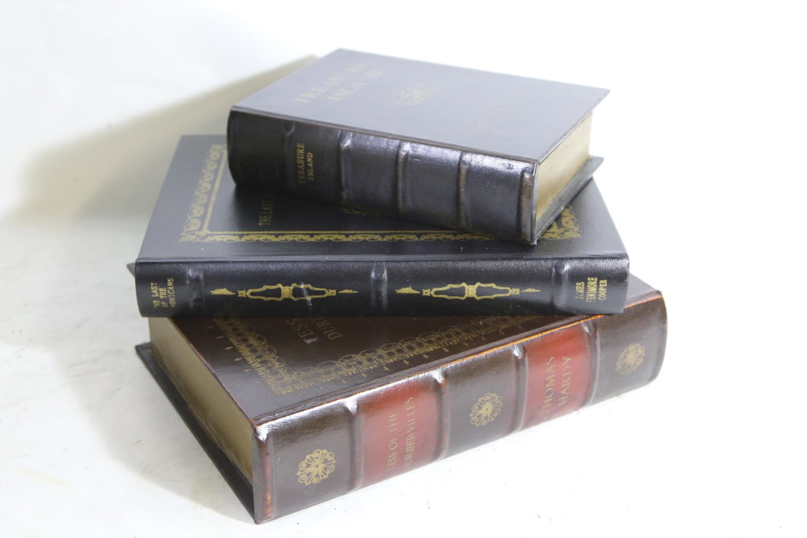 HAND TOOLED LEATHER BOOK BOXES: HANDTOOLED LEATHER BOOK BOXES "TREASURE ISLAND", "LAST OF THE MOHICANS" AND "TESS OF THE DURBERVILLES"