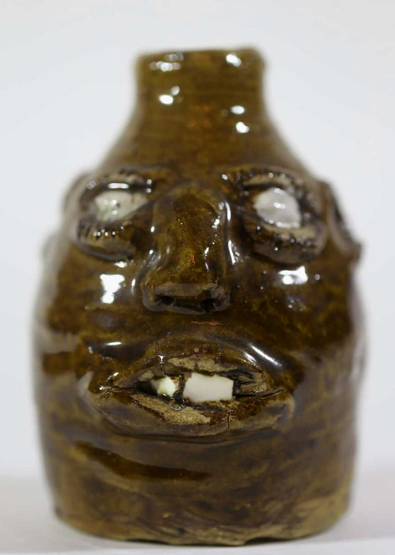 ILLEGEBLY SIGNED FOLK ART FCE JUG: ILLEGEBLY SIGNED FOLK ART FCE JUG POSSIBLY M. ROGERS