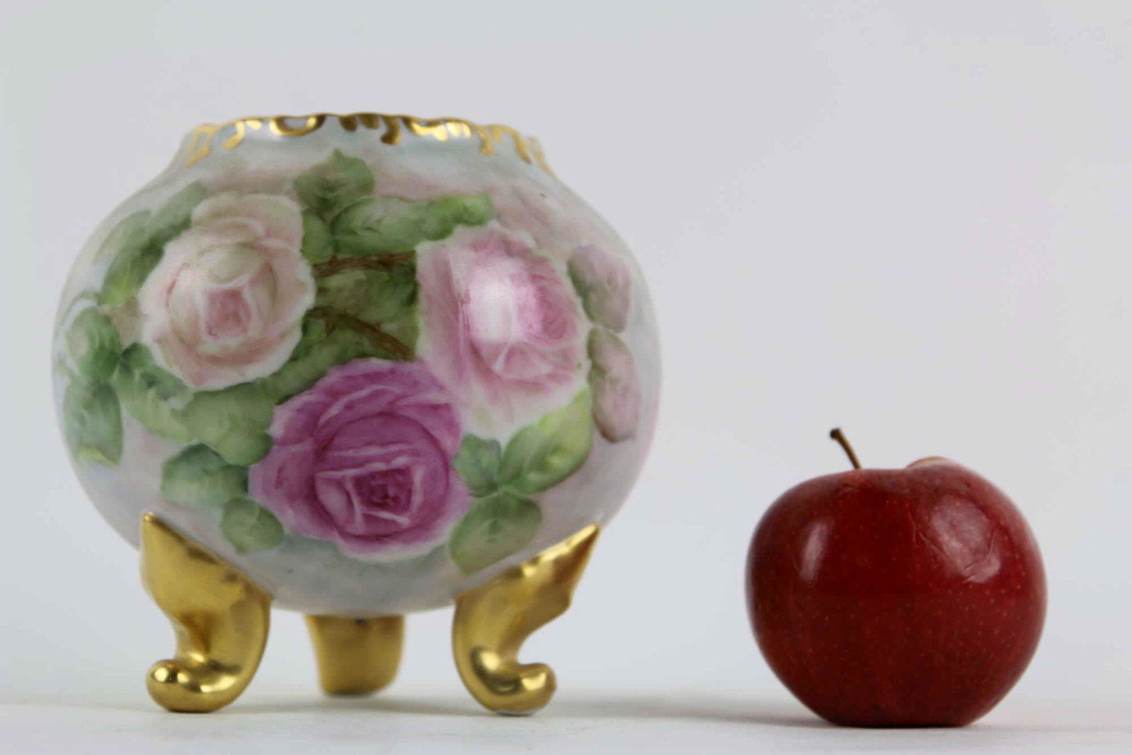 NIPPON STYLE FLORAL GILT FOOTED ROSE VASE SIGNED: NIPPON STYLE FLORAL GILT FOOTED ROSE VASE SIGNED Height 6 Width 6