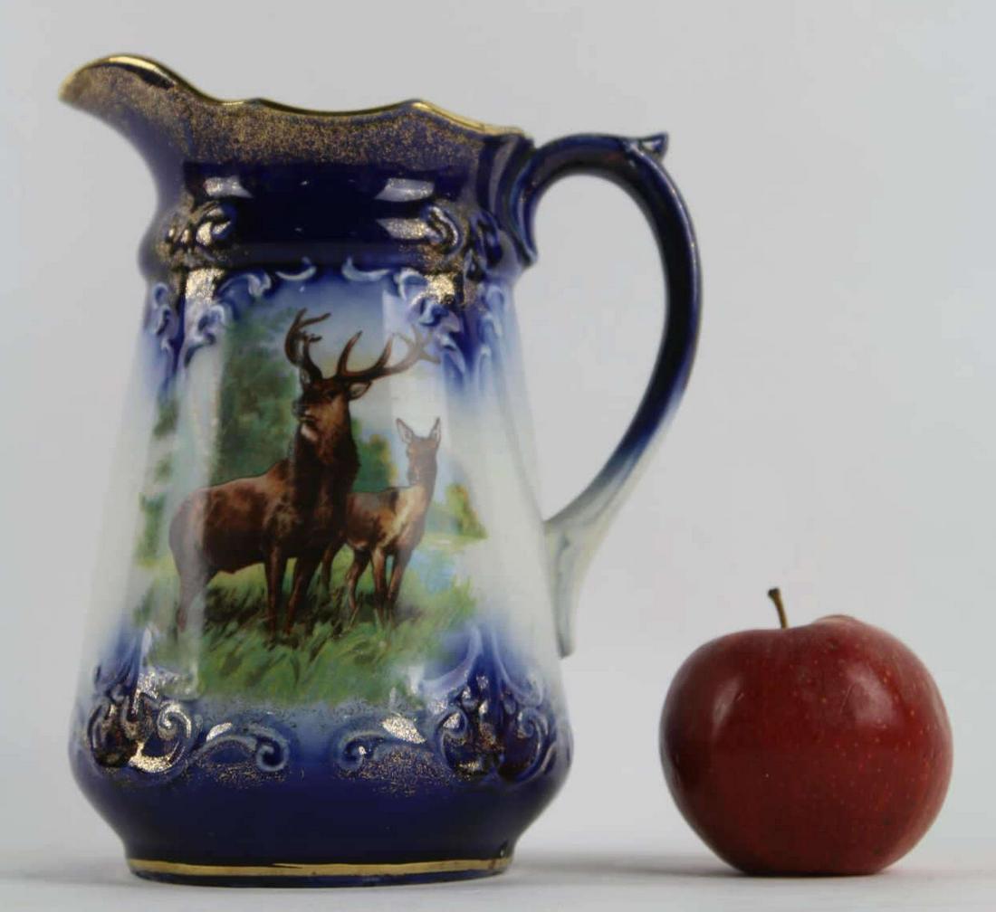 JAPANESE NIPPON COBALT BLUE & GILT MOOSE PITCHER: JAPANESE NIPPON COBALT BLUE & GILT MOOSE PITCHER Height 8 Width 7