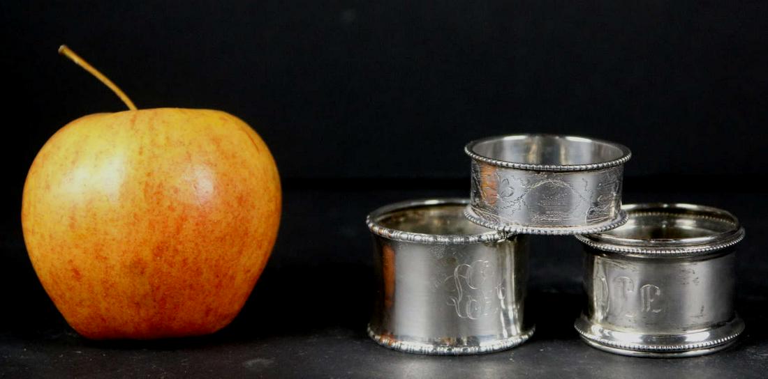 STERLING SILVER NAPKIN RING GROUPING: STERLING SILVER NAPKIN RING GROUPING Condition Report GOOD