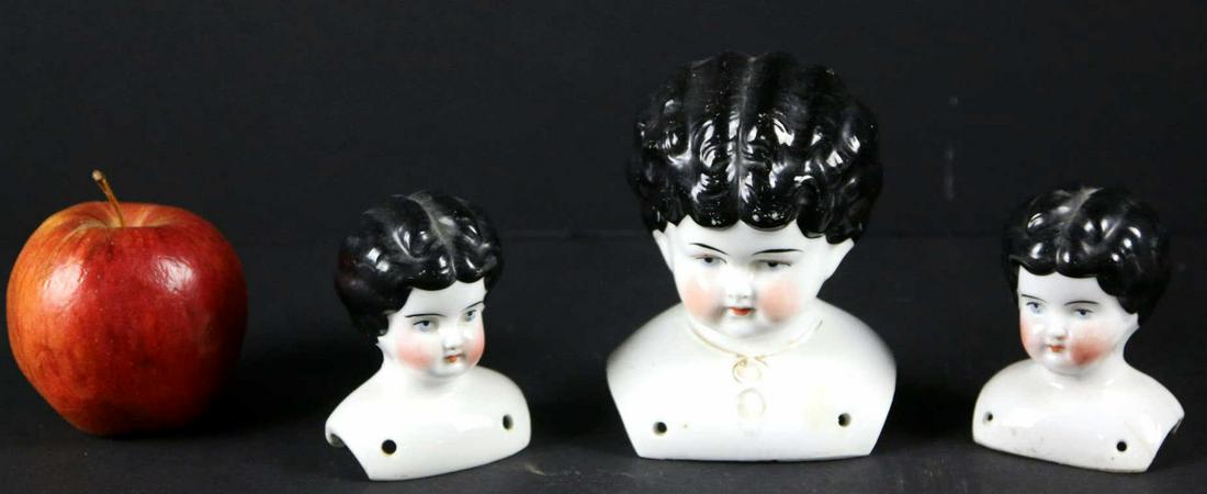 GERMAN ANTIQUE PORCELAIN DOLL HEAD MOUNTS: GERMAN ANTIQUE PORCELAIN DOLL HEAD MOUNTS Condition Report GOOD