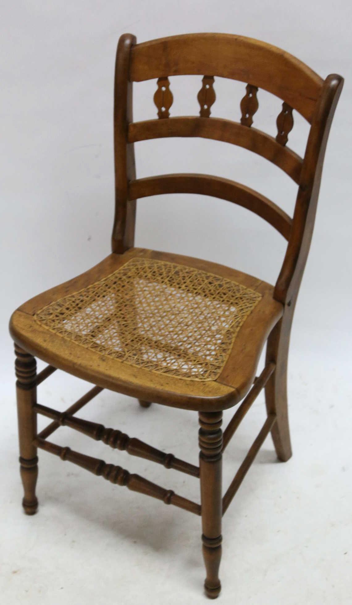 AMERICAN WALNUT CANED TURNED LEG SIDE CHAIR: AMERICAN WALNUT CANED TURNED LEG SIDE CHAIR Condition GOOD H 33 W 18 D 18 in