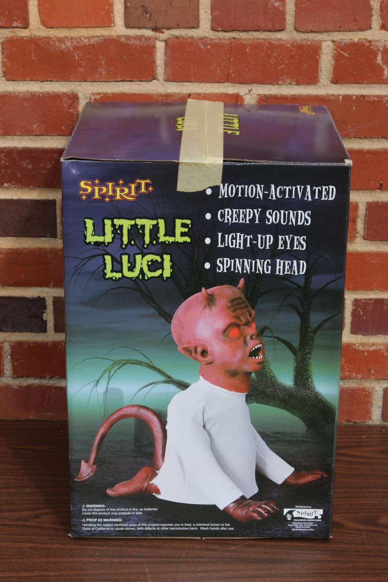 LITTLE LUCI MOTION ACTIVATED HALLOWEEN DECORATION: SPIRIT LITTLE LUCI MOTION ACTIVATED HALLOWEEN DECORATION WITH CREEPY SOUNDS, LIGHT UP EYES, AND SPINNING HEAD Condition GOOD