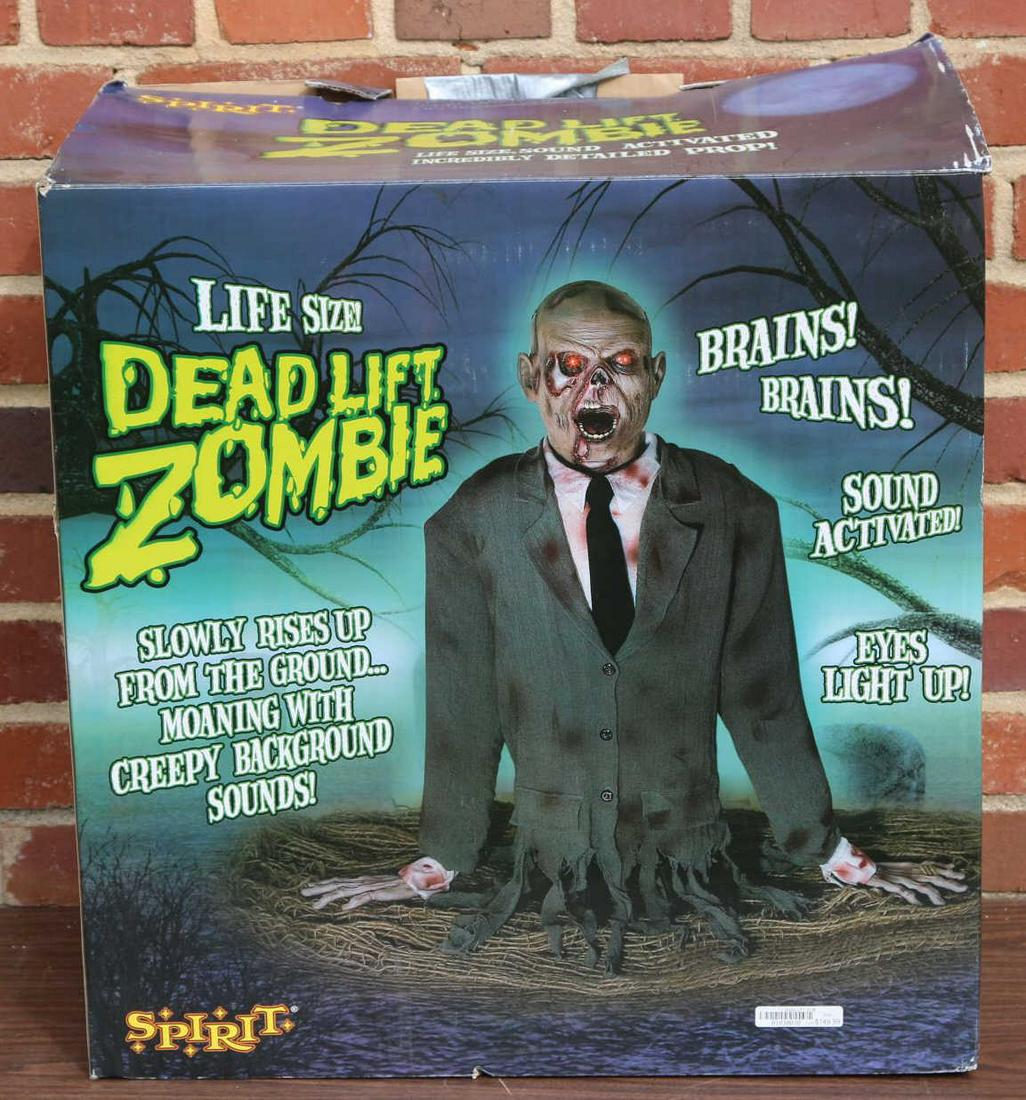 HALLOWEEN DEAD LIFT ZOMBIE SOUND ACTIVATED: SOUND ACTIVATED DEAD ZOMBIE LIFT WITH LIGHTING EYES AND MOANS Condition GOOD