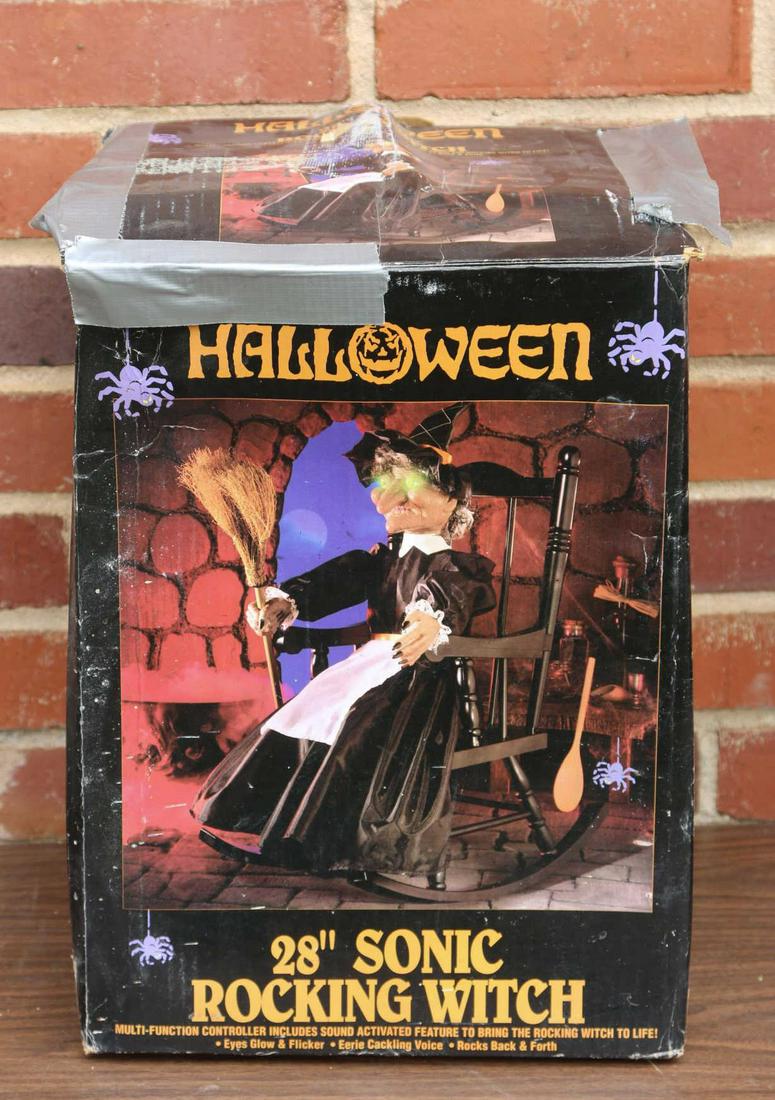 HALLOWEEN 28" SONIC ROCKING WITCH SOUND ACTIVATED: HALLOWEEN 28 INCH SONIC ROCKING WITCH WITH MULTI-FUNCTION CONTROLLER INCLUDES SOUND ACTIVATED FEATURE TO BRING THE ROCKING WITCH TO LIFE WITH GLOWING EYES, CACKLING VOICE,