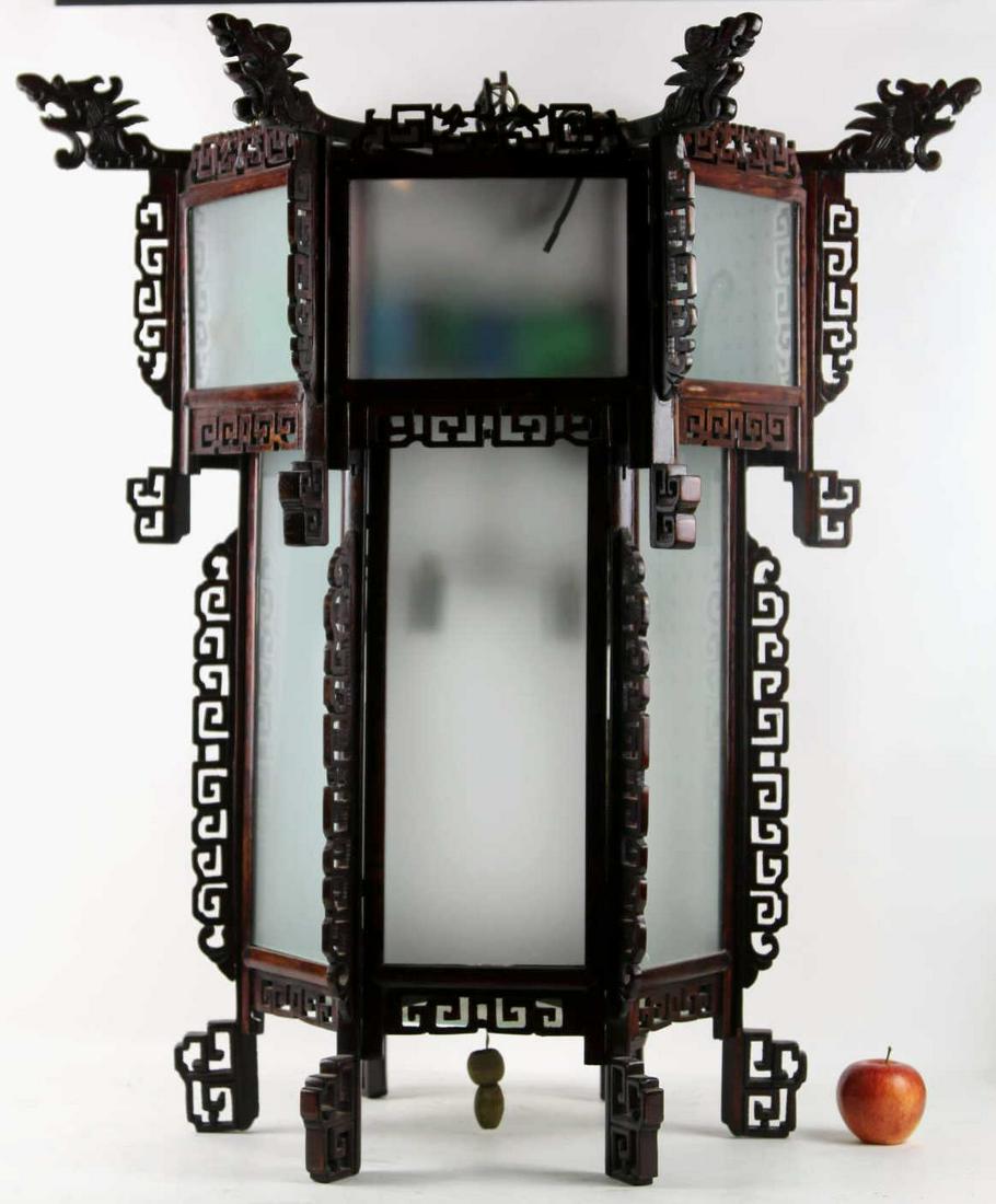 CHINESE 32" CHINOSERIE HAND CARVED DRAGON FIXTURE: CHINESE 32" HAND CARVED VERTICAL PALACE LIGHT FIXTURE Condition GOOD H 32 W 30 IN