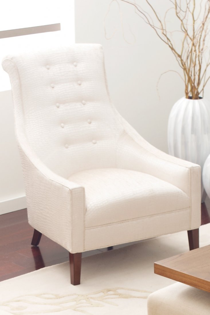 Candice Olson Chair by Highland House: The Candice Olson Chair “Aviva” is the sexy supermodel of slipper chairs with a sloping low arm that slinks around to shape an elongated backrest pitched for deluxe comfort.” An upholstered high