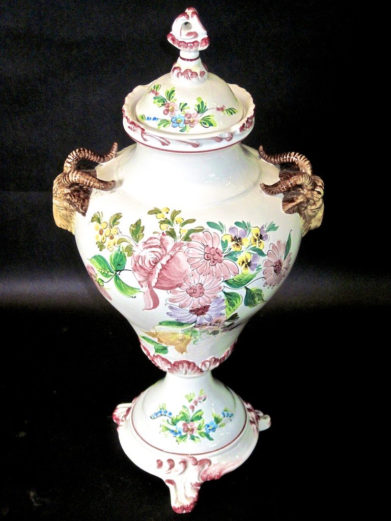 Chelsea House Rams Head Lidded Urn: Fine hand painted Chelsea House footed urn with rams head applications in a Chinese floral motif.