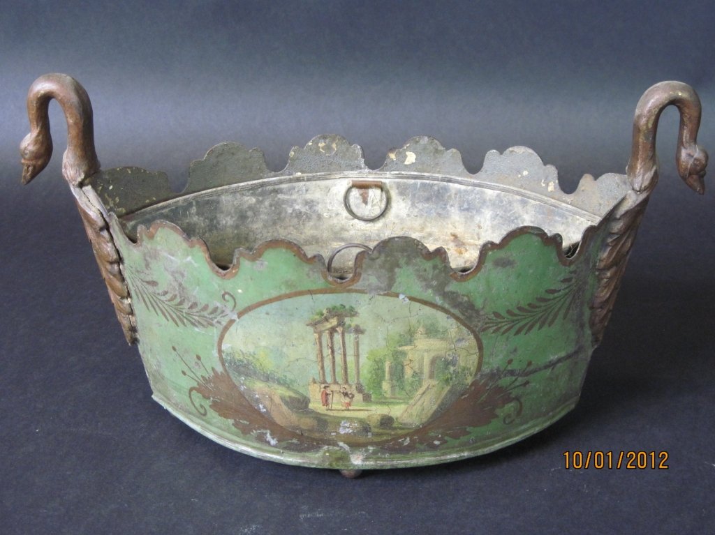 19TH CENTURY TOLE CACHE POT WITH SWANS HEAD HANDLES:: Very nice tole cache pot with Roman architectural ruins with a pale green background and Fleur de Lis decoration. 7.5"H X 12" X 5.25".