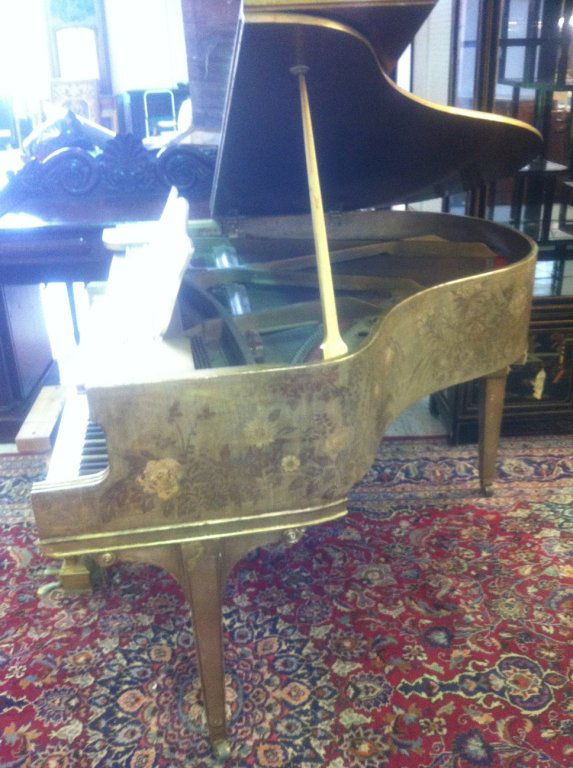 MAX KUEHNE(AMERICAN 1880-1968)JAPANNED EMBELLISH PIANO:: American Gilt Piano by Max Kuehne. 55" X 53.5" X 37". Max Kuehne was born in Halle, Germany on November 7, 1880. During his adolescence the family immigrated to America and settled in Flushing, New Yo