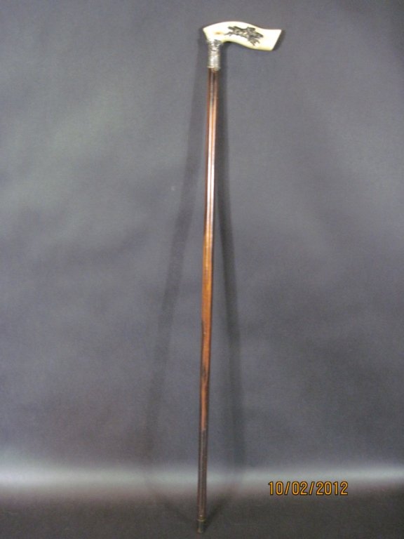 19TH CENTURY IVORY AND STERLING WALKING CANE:: From the Estate of Bob Gibson.