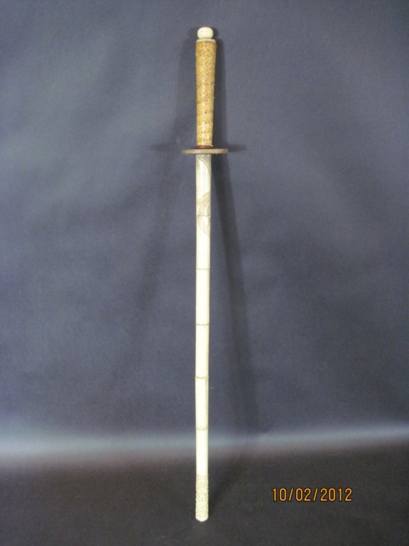 ASIAN SWORD IN BONE AND IVORY:: Fine sword in bone and ivory.