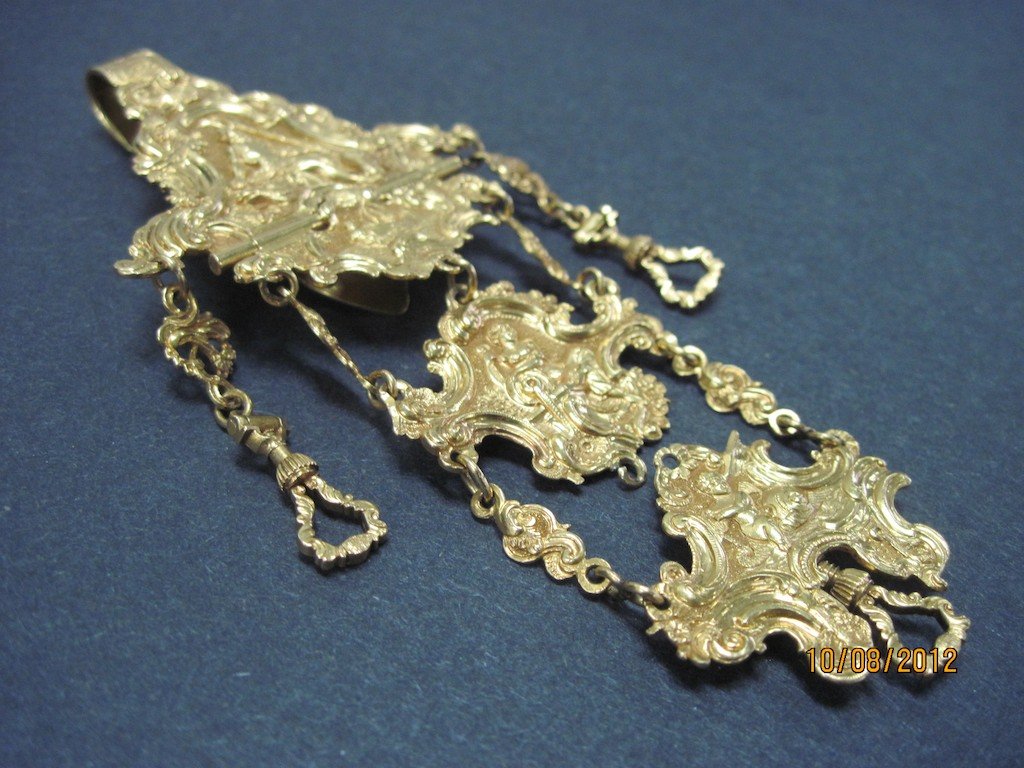 IMPORTANT EARLY GOLD HALLMARKED CHATELAINE:: Very fine early gold English hallmarked chatelaine. The finest we have seen bearing marks on the reverse clip. The detail is above grade.