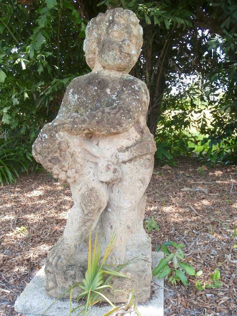 VINTAGE SPANISH PUTTI FIGURE:: Antique Spanish stone carved figure on column. Phase 3- Lift required. Reclamation terms: The Talmo property has been sold for tract development. The house will be demolished. Included in this auction