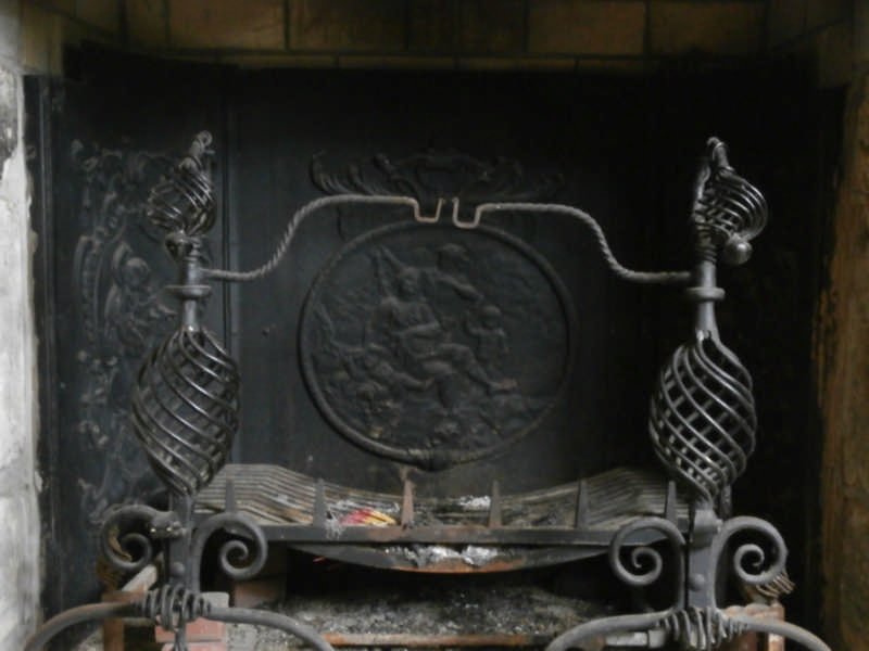 ANTIQUE CAST IRON FIREBACK: ANTIQUE IRON FIREBACK IN FRENCH STACK STONE FIREPLACE Phase 3- Removal quote 200.00. Reclamation terms: The Talmo property has been sold for tract development. The house will be demolished. Included i