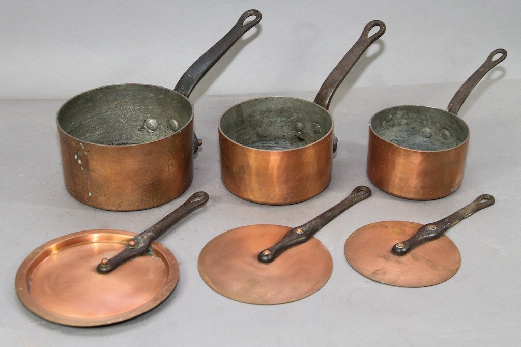 SET OF THREE ANTIQUE COPPER COVERED SAUCE PANS:: 3.25" X 13"W