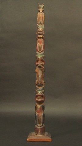 HAND CARVED TRIBAL TOTEM POLE:: 24.5"H X 4"W.