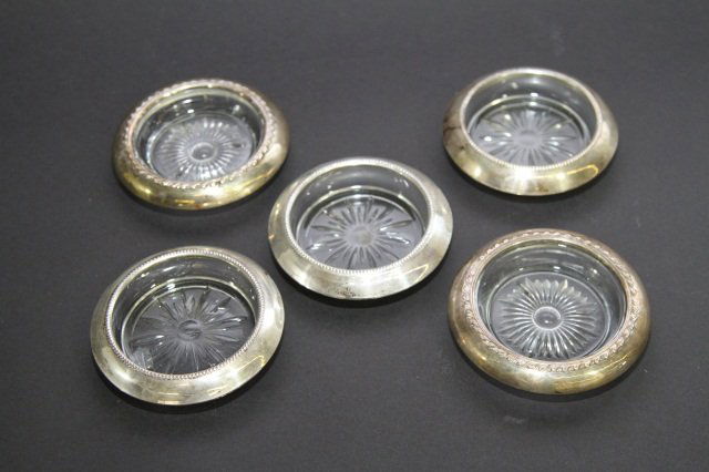 STERLING RIMMED COASTERS:: 4" in diameter.