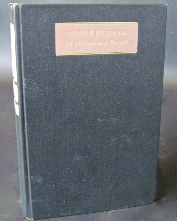 SIGNED NORMAN ROCKWELL BOOK: My Adventures As An Illustrator. Black cloth binding; Doubleday & Co., 1960. Signed, "Sincerely Norman Rockwell". 9.5"H X 1.5"D X 6.25"W.