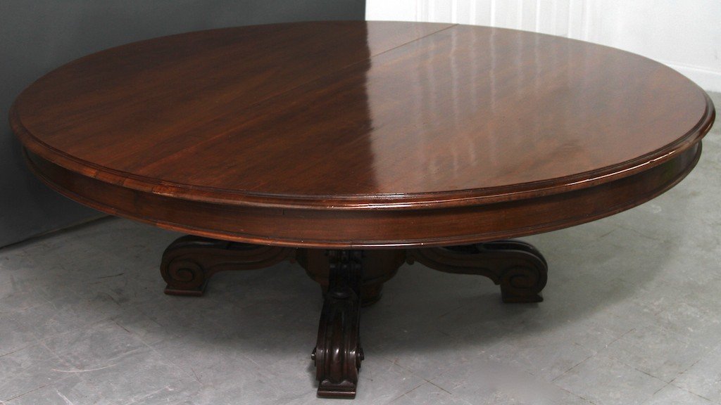 PALATIAL OVERSIZED ROUND MAHOGANY TABLE:: 96" in diameter.