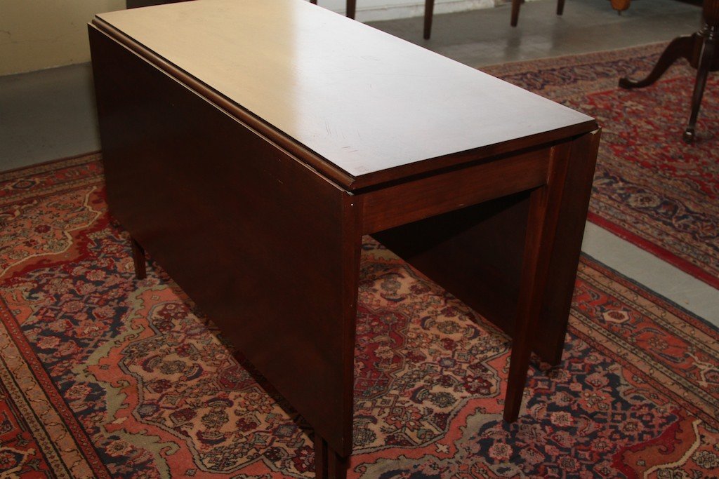 WALNUT DROP LEAF TABLE:: 30"H X 64.5"W X 48"D