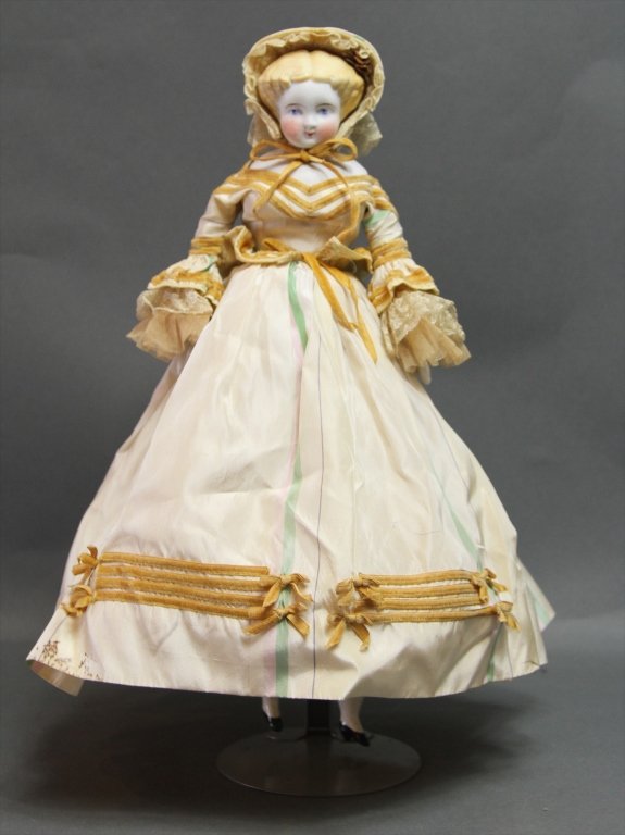PRIMITIVE ANTIQUE FRENCH PORCELAIN DOLL:: 16"H X 11"W X 12"D