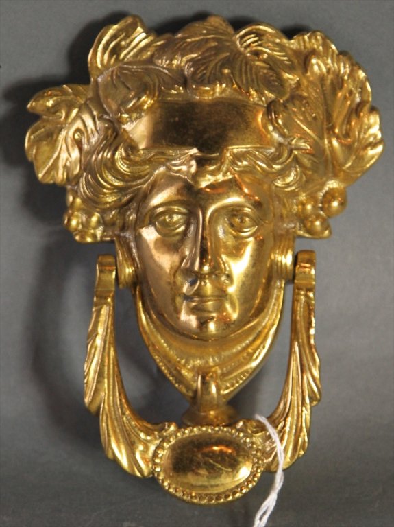 BRASS DOOR KNOCKER:: Brass door knocker.