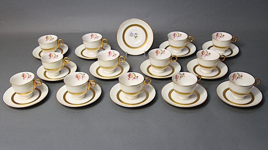 SET OF DEMITASSE CUPS & SAUCERS:: Theodore Haviland. 13 cups 2.25"H X 2.25"W/ 14 saucers 5" in diameter