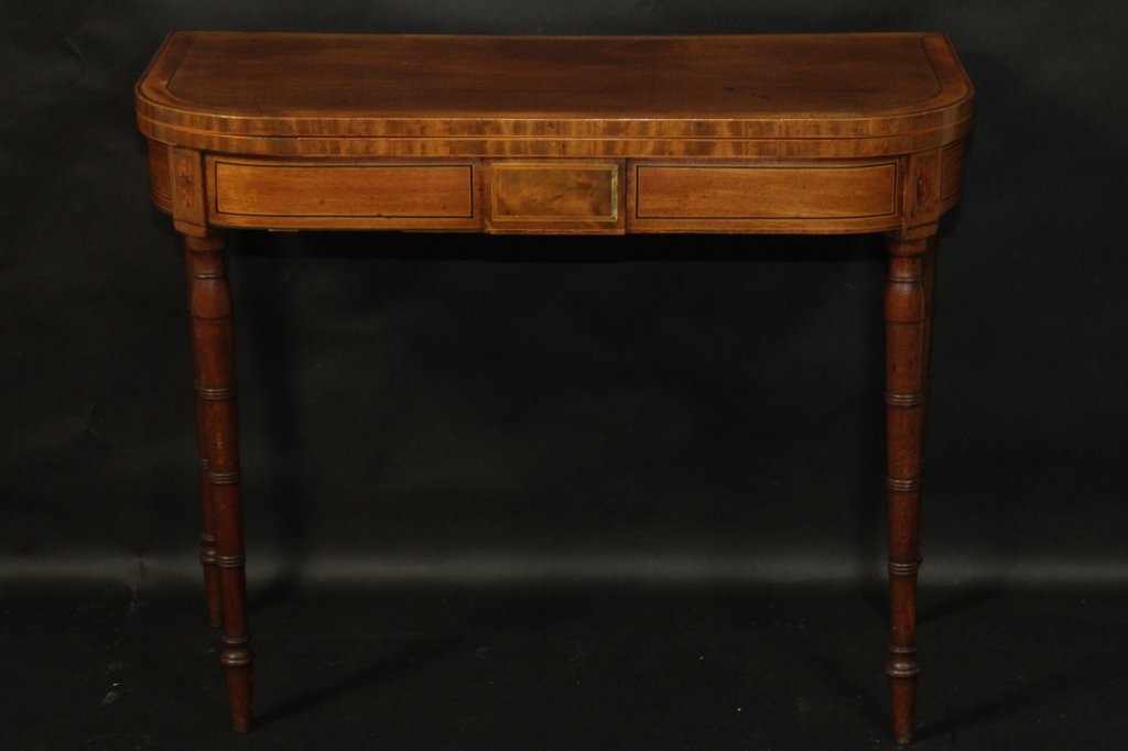 18TH C. ENG. MAH. HEPPLEWHITE INLAID GAME TABLE:: 29"H X 36.5"W X 18"D 18th century faded mahogany hepplewhite game table crossbanded with satinwood and ebony stringing. The legs are turned faux bamboo. The interior is lined with baise.