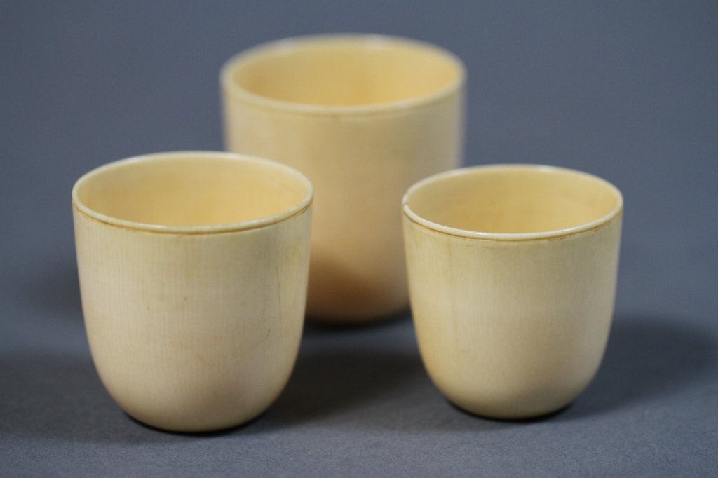 CHINESE IVORY GRADUATED CUPS:: Tallest: 2"H X 2"D