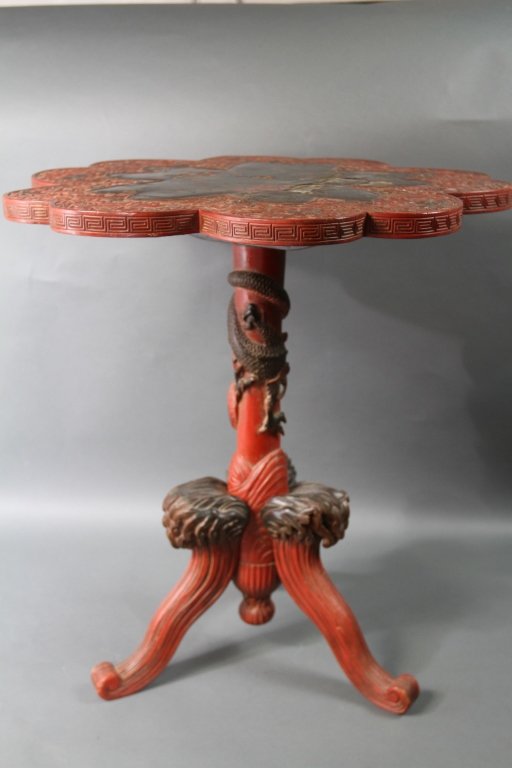 CHINESE CINNABAR DRAGON TABLE:: 28.5"H X 25.25" in diameter