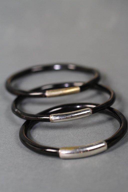 CHINESE EBONY & SILVER SET OF THREE BANGLES:: Three bangles