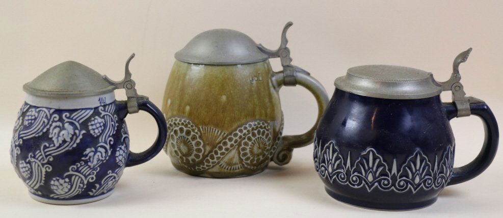 GERMAN ANTIQUE LIDDED PINT LOT OF 3: GERMAN ANTIQUE LIDDED PINTS; HEIGHTS ARE 6", 5.5", AND 4"