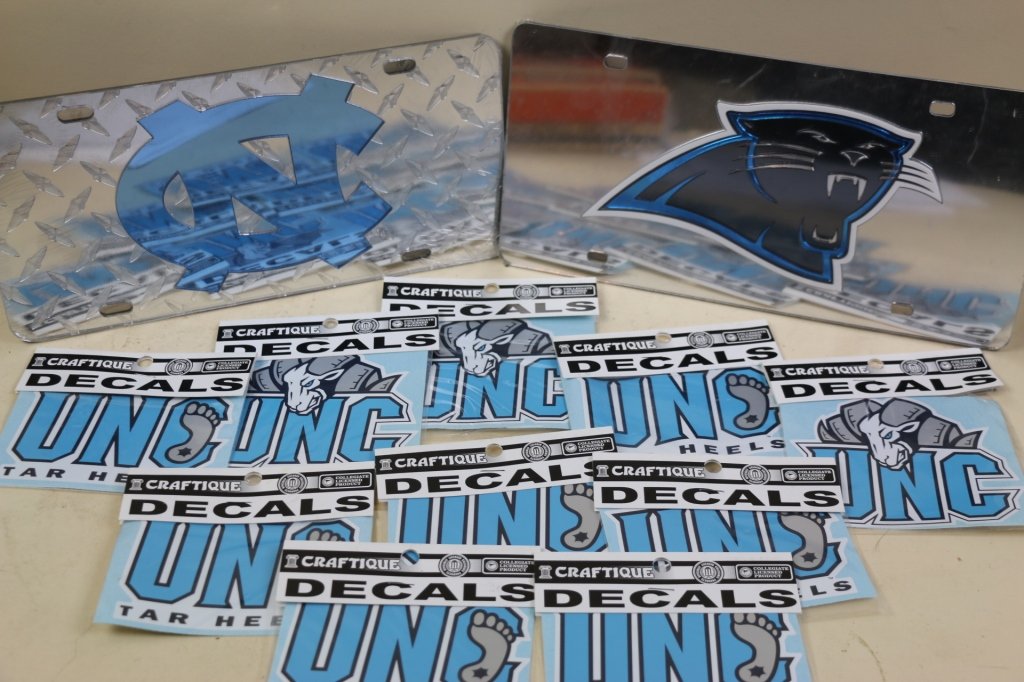 UNC AND PANTHER DECAL AND LICENSE LOT: UNC AND PANTHER DECAL AND LICENSE LOT