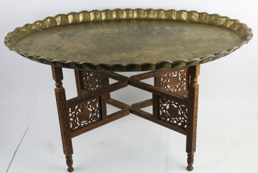 VINTAGE MID CENTURY MOROCCAN BRASS TRAY TABLE: VINTAGE MID CENTURY MOROCCAN BRASS TRAY TABLE WITH HAND CARVED BASE 18X33X20