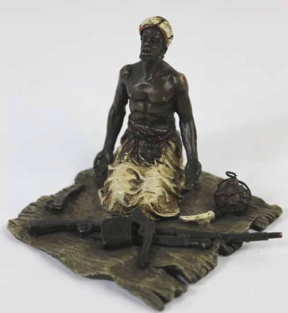 FRANZ XAVIER BERGMANN (1861-1936) BRONZE: FRANZ XAVIER BERGMANN (1861-1936) PRAYING MAN. Large Austrian cold painted bronze representing a praying warrior with his arms on a carpet. Portant une marque "B" sur la tunique et notée "8598 Geschu