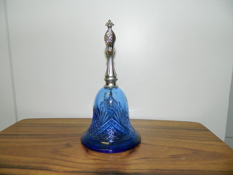 Avon blue bell shaped perfume bottle: Avon blue bell shaped perfume bottle