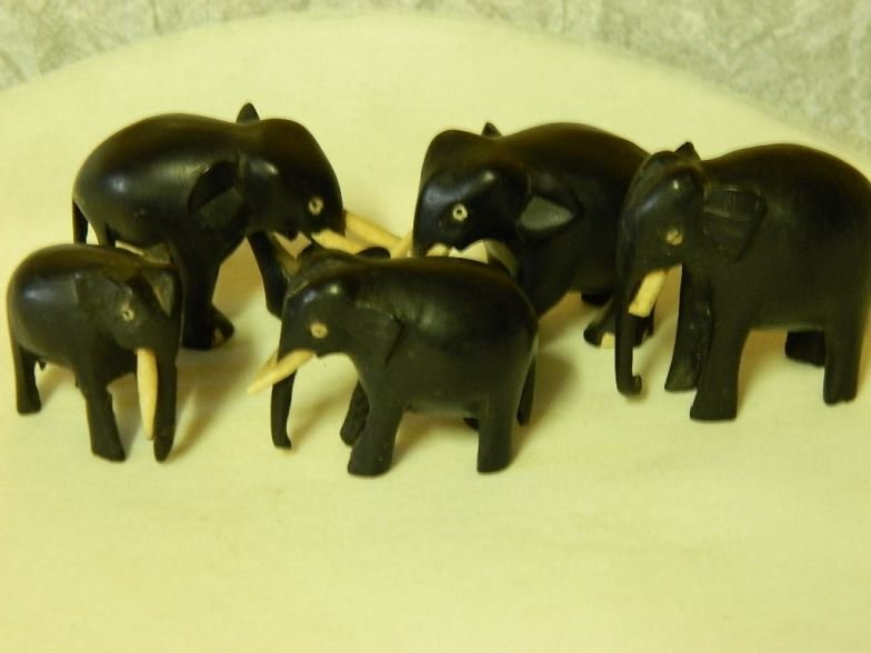 Five ebony elephants: Five ebony elephants