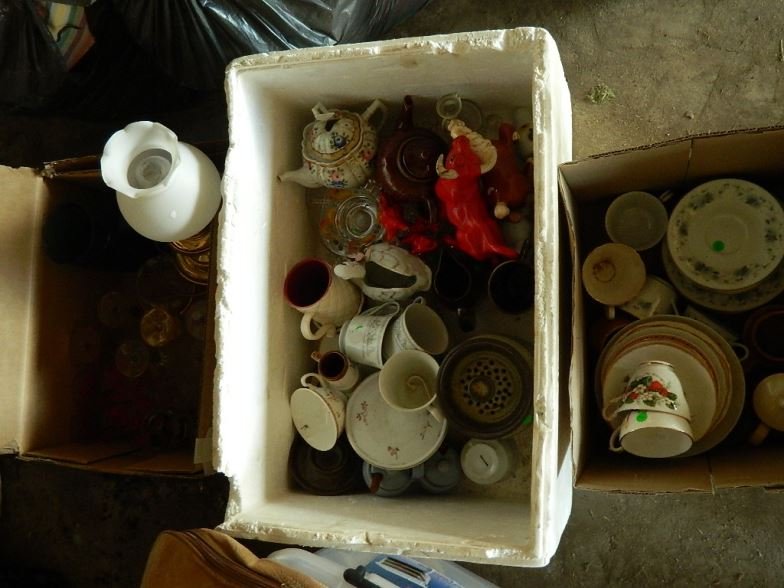 Box lot: Three boxes of cups, saucers, side plates, mugs, jugs, one lamp and various ornaments and drinking glasses