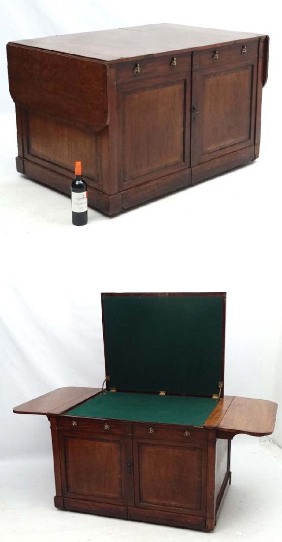 An early 19 th C mahogany unusual Folio Desk from a: An early 19 th C mahogany unusual Folio Desk from a library , with 2 door cupboard under and lift up baize section to top, 32 1/4'' deep x 72 1/2'' ( extended) x 30'' high