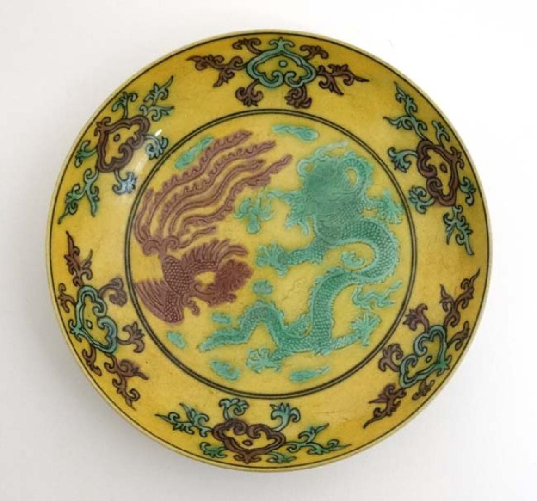 An Imperial yellow '' dragon'' dish , decorated with  5 (1 of 3)