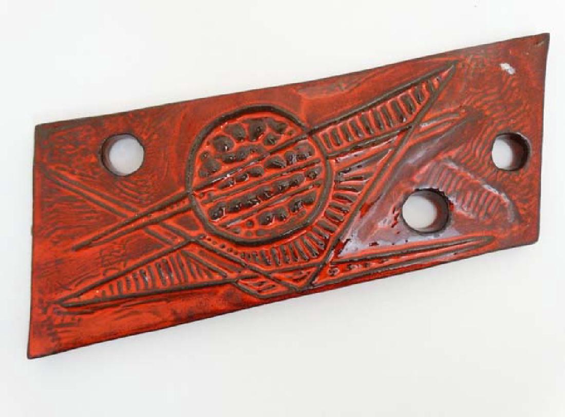 Scandinavian Pottery: A c1970s Upsala Ekeby , Sweden ,: Scandinavian Pottery: A c1970s Upsala Ekeby , Sweden , red abstract plaque, numbered 0116 E, bears impressed factory stamp and indistinct signature to base. 12'' long approx.